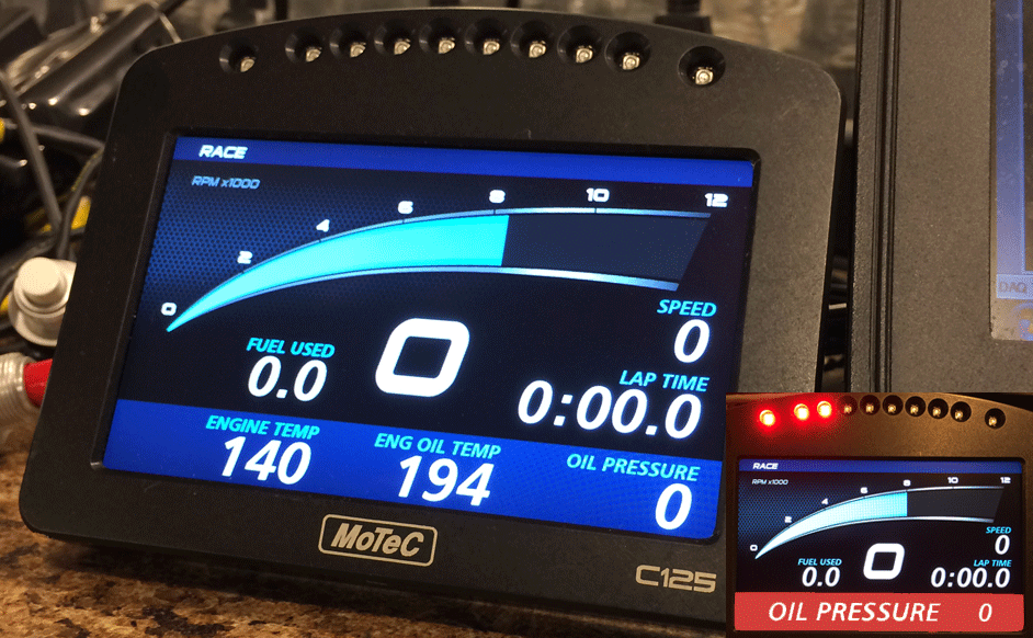 C125 MoTeC Display Logger being tested with alarm shown.